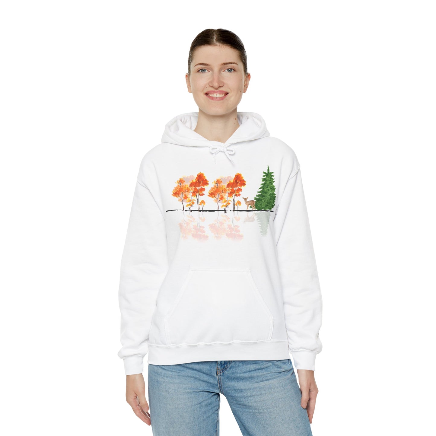 Person wearing a white hoodie with a nature-themed design on a white background