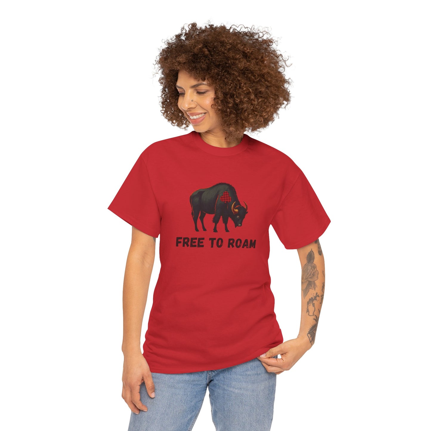 Person wearing a red t-shirt with a graphic of a bison and text on a white background