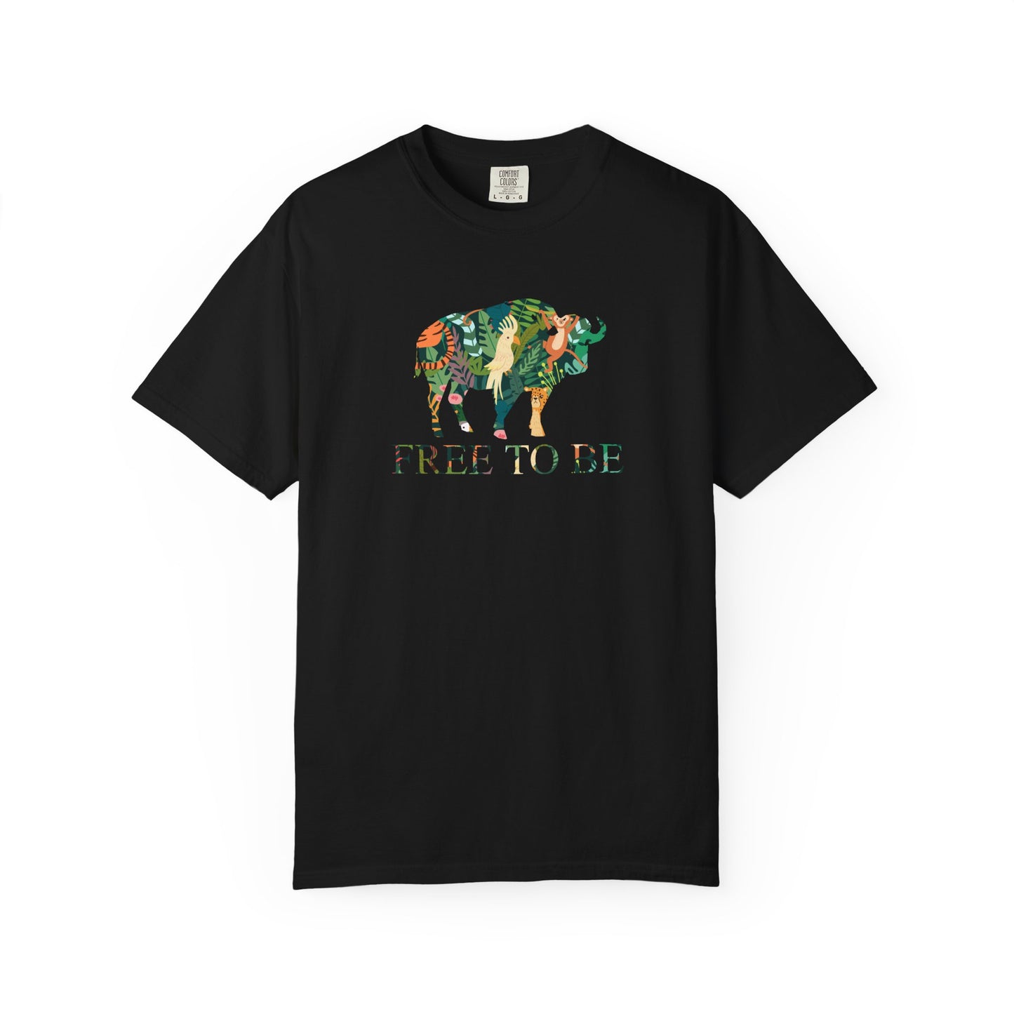 White t-shirt with a colorful graphic of a buffalo and text 'FREE TO BE' on a white background
