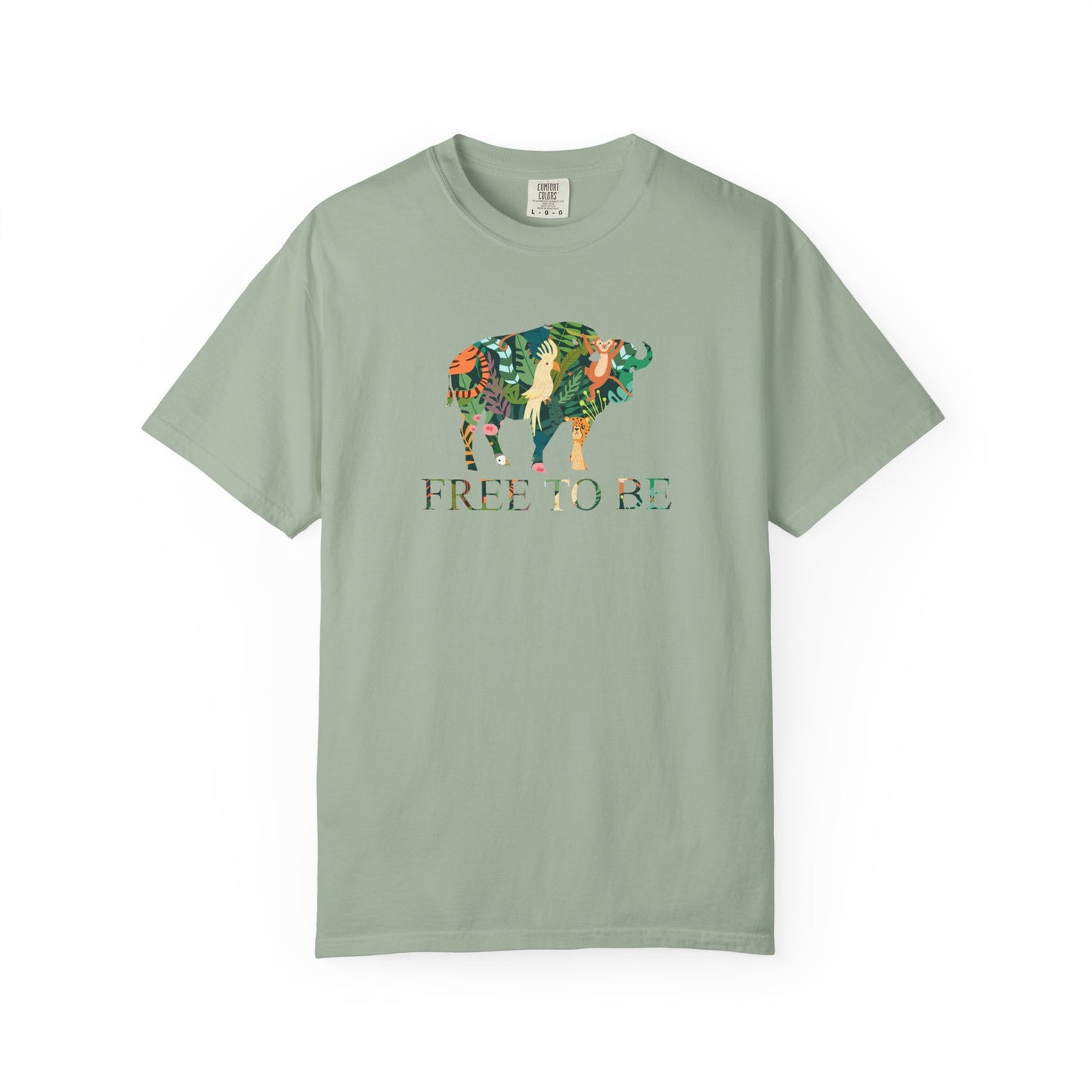 Green t-shirt with a colorful graphic of a buffalo and text 'FREE TO BE' on a white background