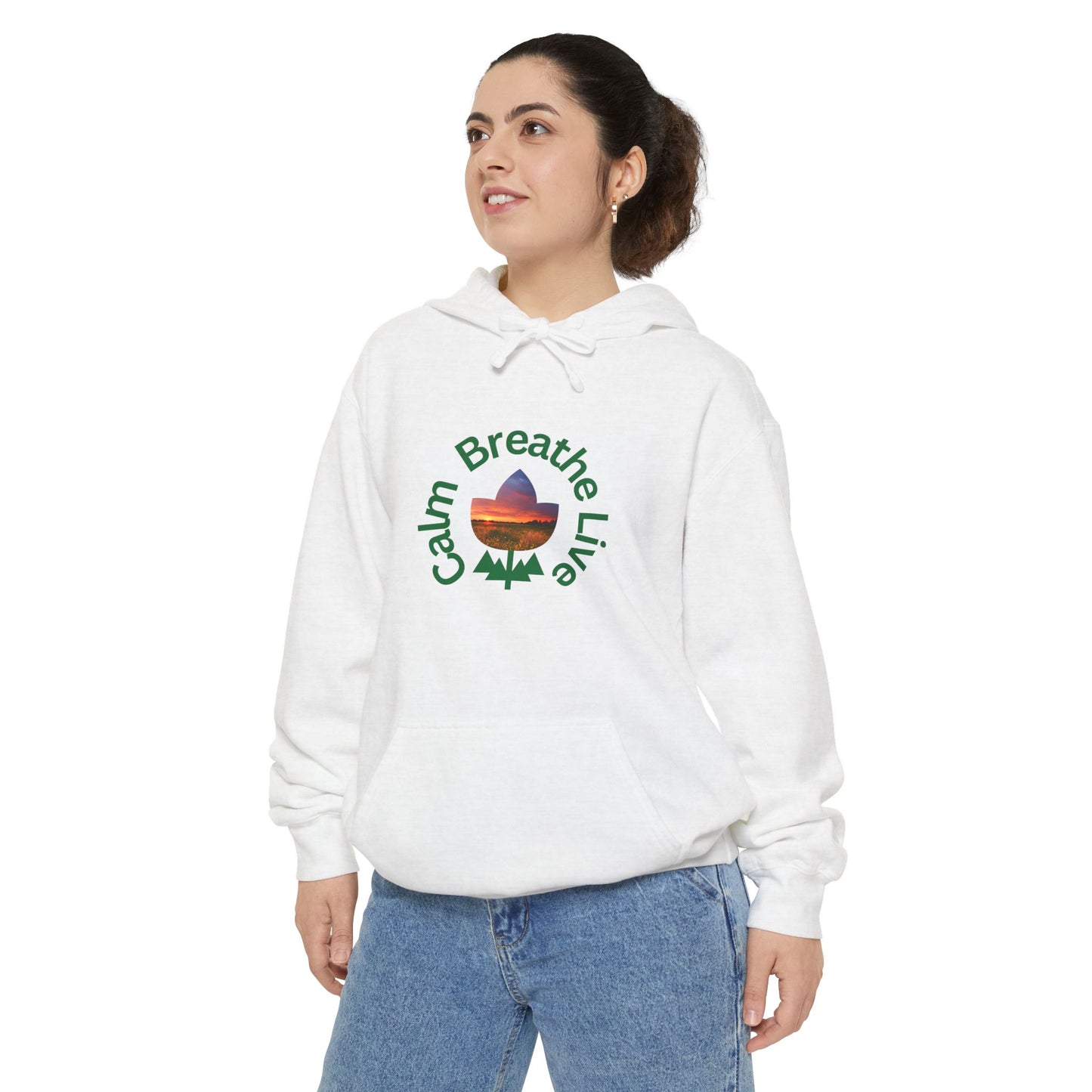 Person wearing a white hoodie with a colorful graphic and text on a white background