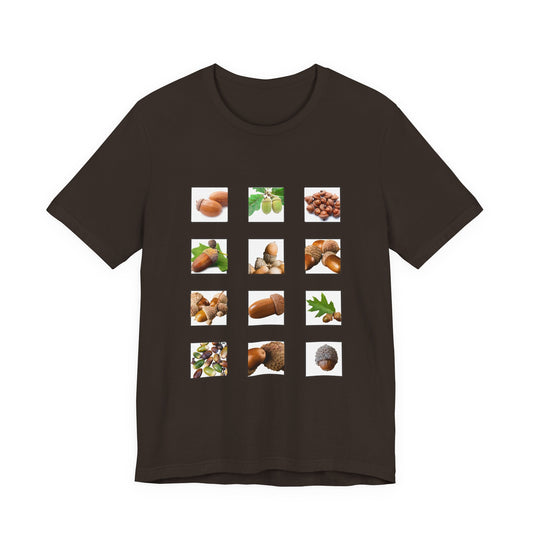 Brown t-shirt with images of acorns and leaves arranged in a grid postage stamp pattern on a white background