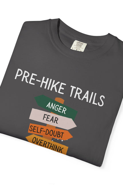Folded dark gray t-shirt with 'Pre-Hike Trails' text and graphic on a white background