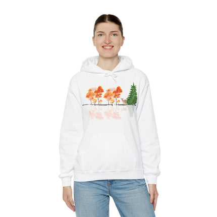 Person wearing a white hoodie with a nature-themed design on a white background