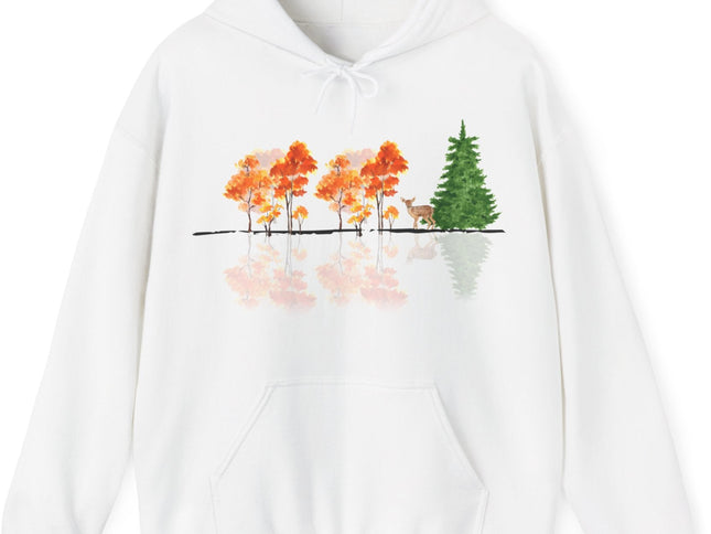 White hoodie with a nature-themed design on a white background. Reflective trees and fawn on front.