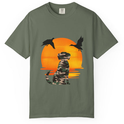 Green t-shirt with a camouflage dog and ducks design on an orange sunset background