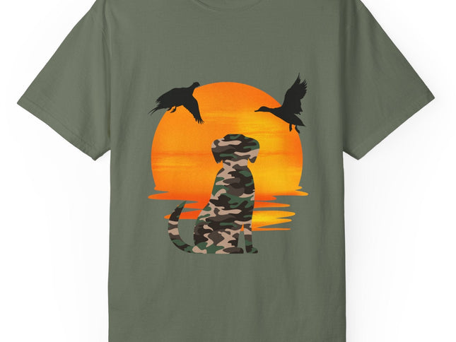 Green t-shirt with a camouflage dog and ducks design on an orange sunset background