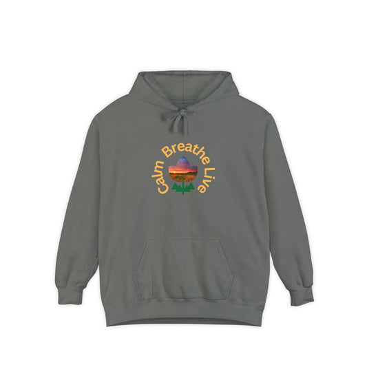 Gray hoodie with 'Calm Breathe Live' text and landscape graphic on a white background