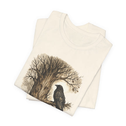 Folded fabric with a tree and bird design on a white background