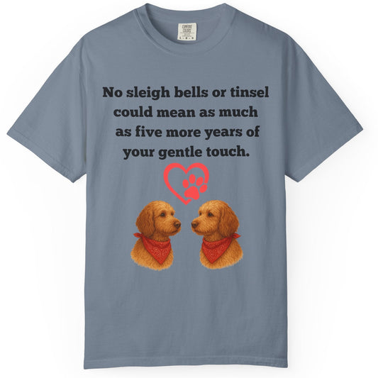 Blue t-shirt with two dogs, a heart, and text on a white background