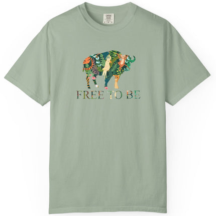 Green t-shirt with a colorful graphic of a buffalo and text 'FREE TO BE' on a white background