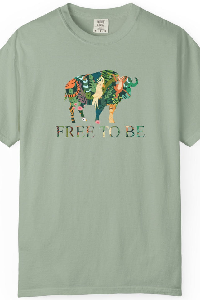 Green t-shirt with a colorful graphic of a buffalo and text 'FREE TO BE' on a white background