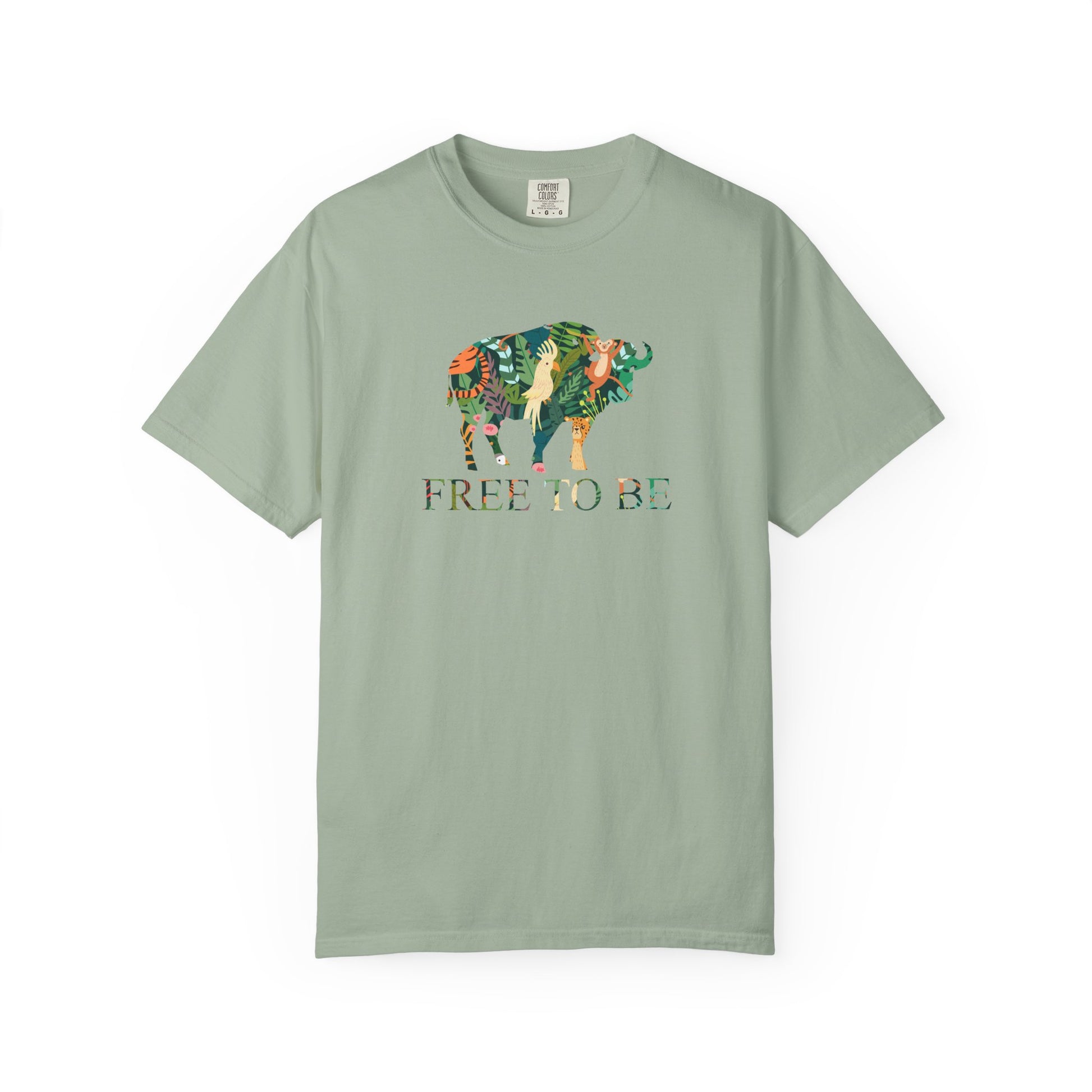 Green t-shirt with a colorful graphic of a buffalo and text 'FREE TO BE' on a white background
