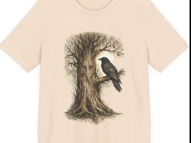 Beige t-shirt with a tree and bird design on a white background