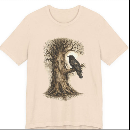Beige t-shirt with a tree and bird design on a white background