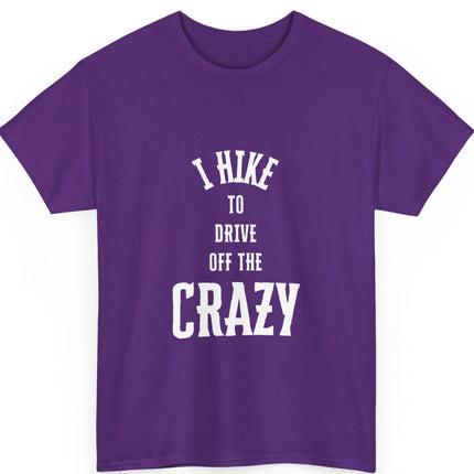 Purple t-shirt with white text 'I hike to drive off the crazy' on a white background