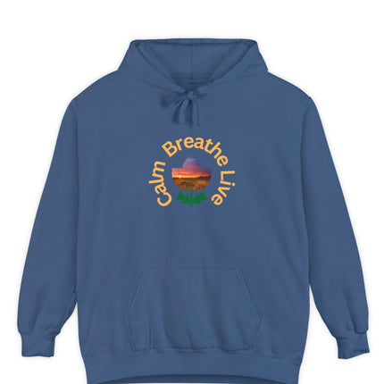 Blue hoodie with 'Calm Breathe Live' text and landscape graphic on a white background