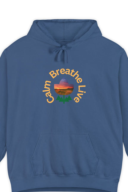 Blue hoodie with 'Calm Breathe Live' text and landscape graphic on a white background