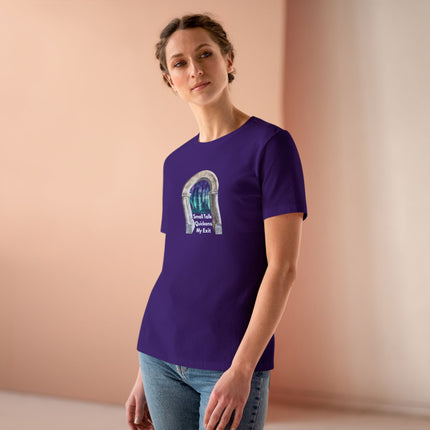 Woman wearing a purple t-shirt with a graphic design on a beige background