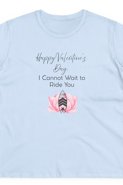 Light blue t-shirt with Valentine's Day design featuring a pink flower and surfboard on a white background