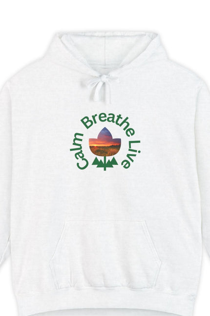 White hoodie with 'Calm Breathe Live' text and landscape graphic on a white background