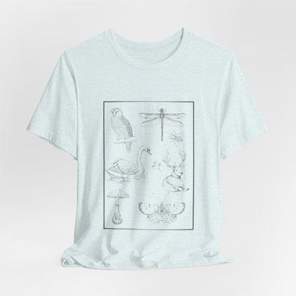 A light heather gray short-sleeve t-shirt with a black line art graphic print of various nature illustrations (owl, dragonfly, swan, deer, mushroom, butterfly) inside a thin rectangular border on the front, displayed against a light gray background.