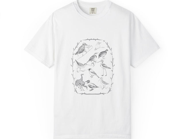 A white short-sleeve crewneck t-shirt featuring a central graphic print of various birds and cranes enclosed in a woody oval frame, displayed on a clean white background.