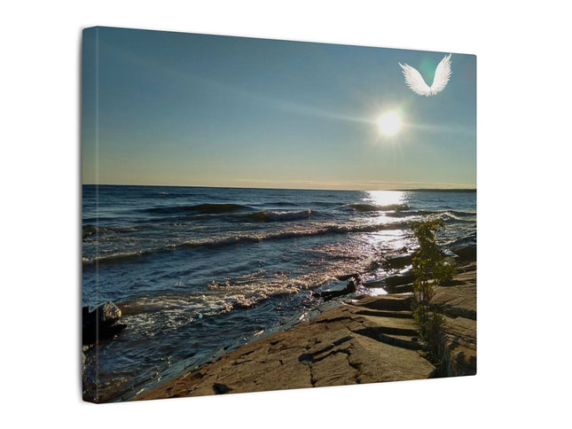 Canvas print of a beach scene with waves and a sun, featuring a white dove icon.