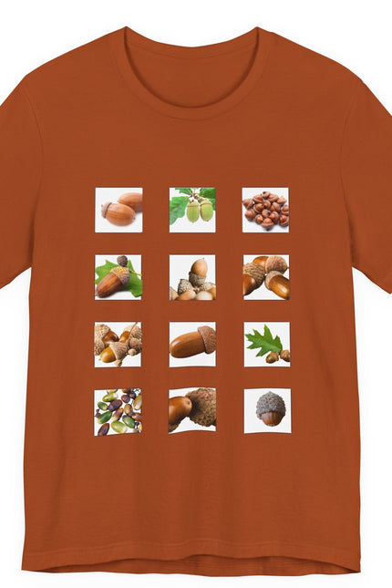 Brown t-shirt with nature-themed design featuring acorns and leaves on a white background