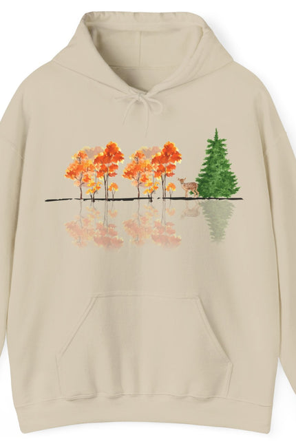 Sand hoodie with a nature-themed design on a white background. Reflective trees and fawn on front.