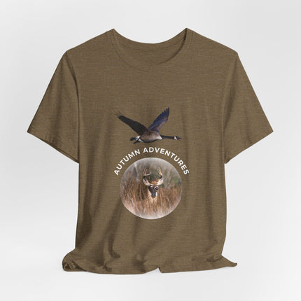 Heather green t-shirt with text stating "Autumn Adventures" with a big buck below it and a goose above it.