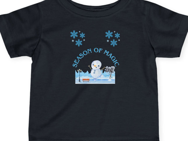 Black t-shirt with a snowman graphic and 'Season of Magic' text on a white background