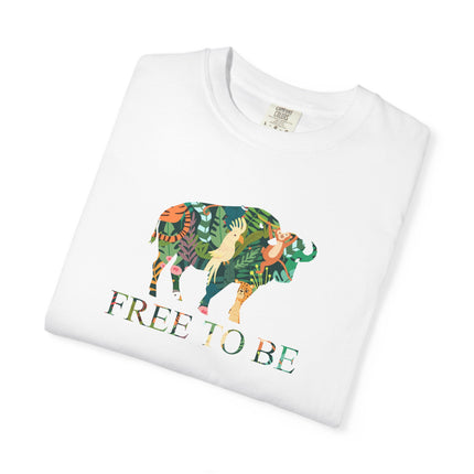 Folded White t-shirt with a colorful graphic of a buffalo and text 'FREE TO BE' on a white background