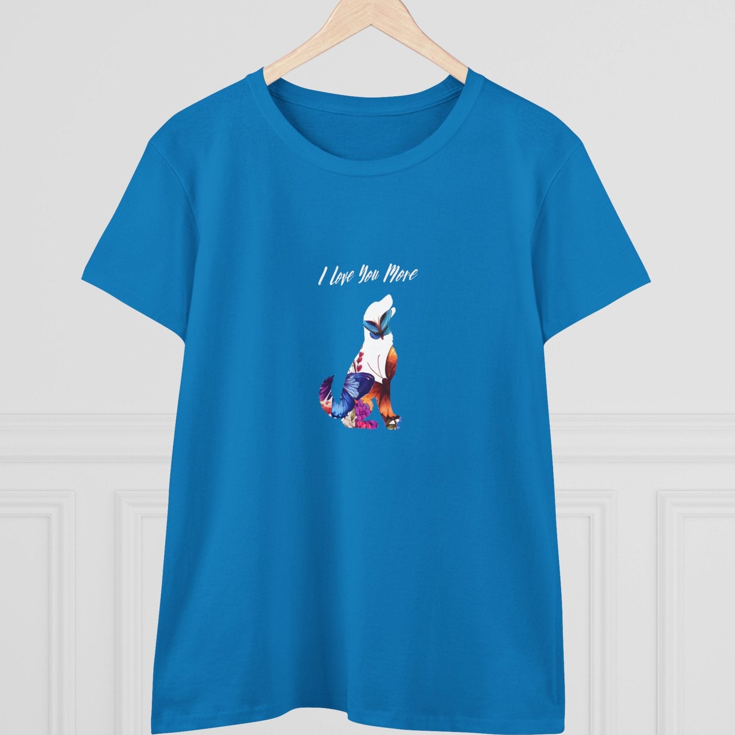 Blue t-shirt with a graphic design on a hanger against a white background