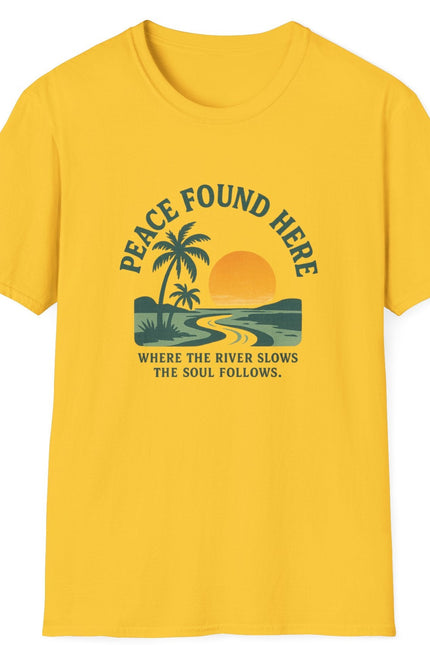 Yellow t-shirt with a tropical graphic and text on a white background