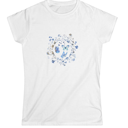 White t-shirt with blue butterfly and flower design on a white background