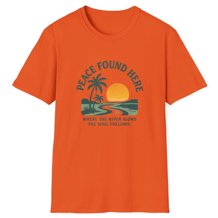 Orange t-shirt with a tropical graphic and text on a white background