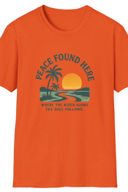 Orange t-shirt with a tropical graphic and text on a white background