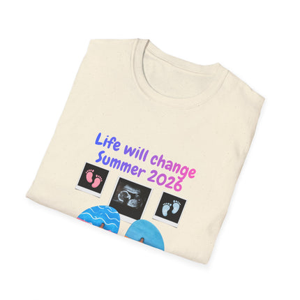 Folded beige t-shirt with baby-themed design and text on a white background