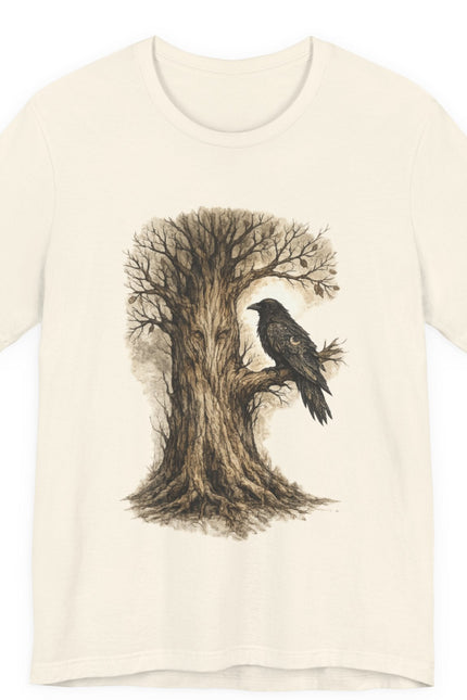 Beige t-shirt with a tree and bird design on a white background