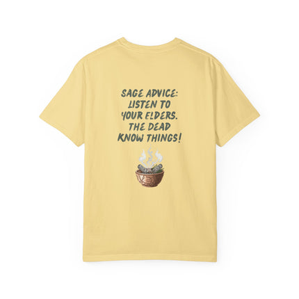 A pale yellow t-shirt with a humorous graphic on the front. The graphic features the text 'SAGE ADVICE: LISTEN TO YOUR ELDERS.