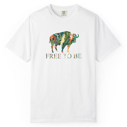 White t-shirt with a colorful graphic of a buffalo and text 'FREE TO BE' on a white background