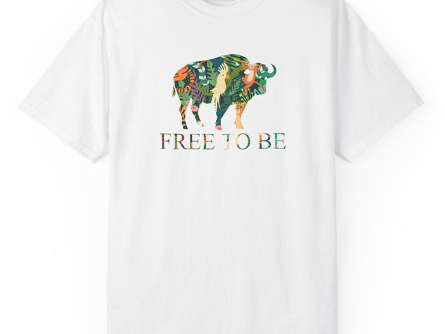 White t-shirt with a colorful graphic of a buffalo and text 'FREE TO BE' on a white background