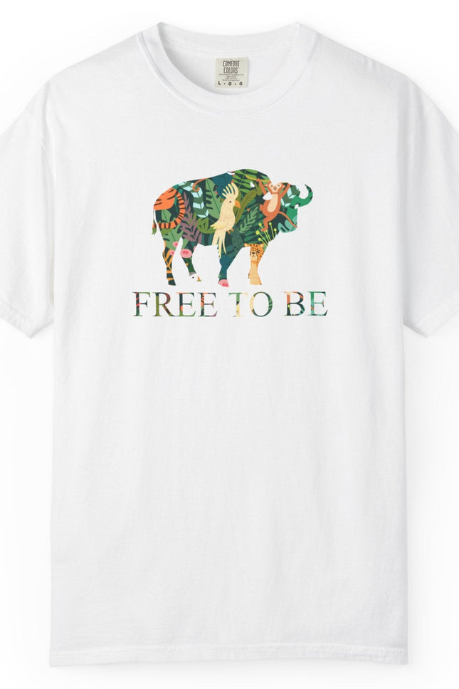 White t-shirt with a colorful graphic of a buffalo and text 'FREE TO BE' on a white background