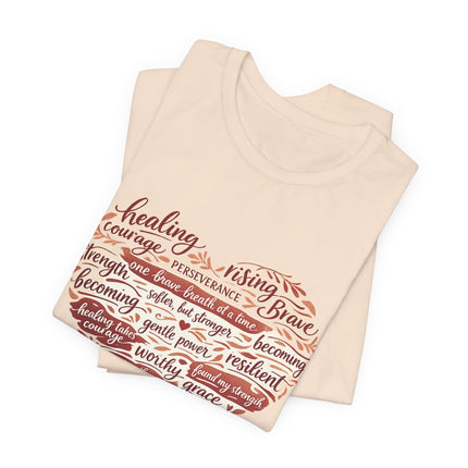 Beige tank top with motivational text design on a white background
