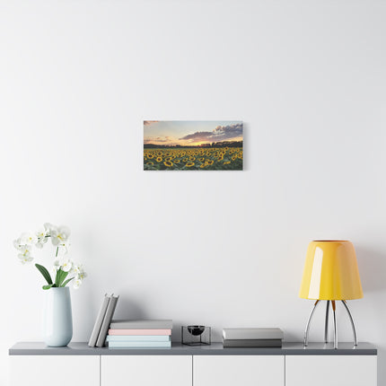 Canvas print of a sunset over a field hanging on a white wall above a shelf with decor items.