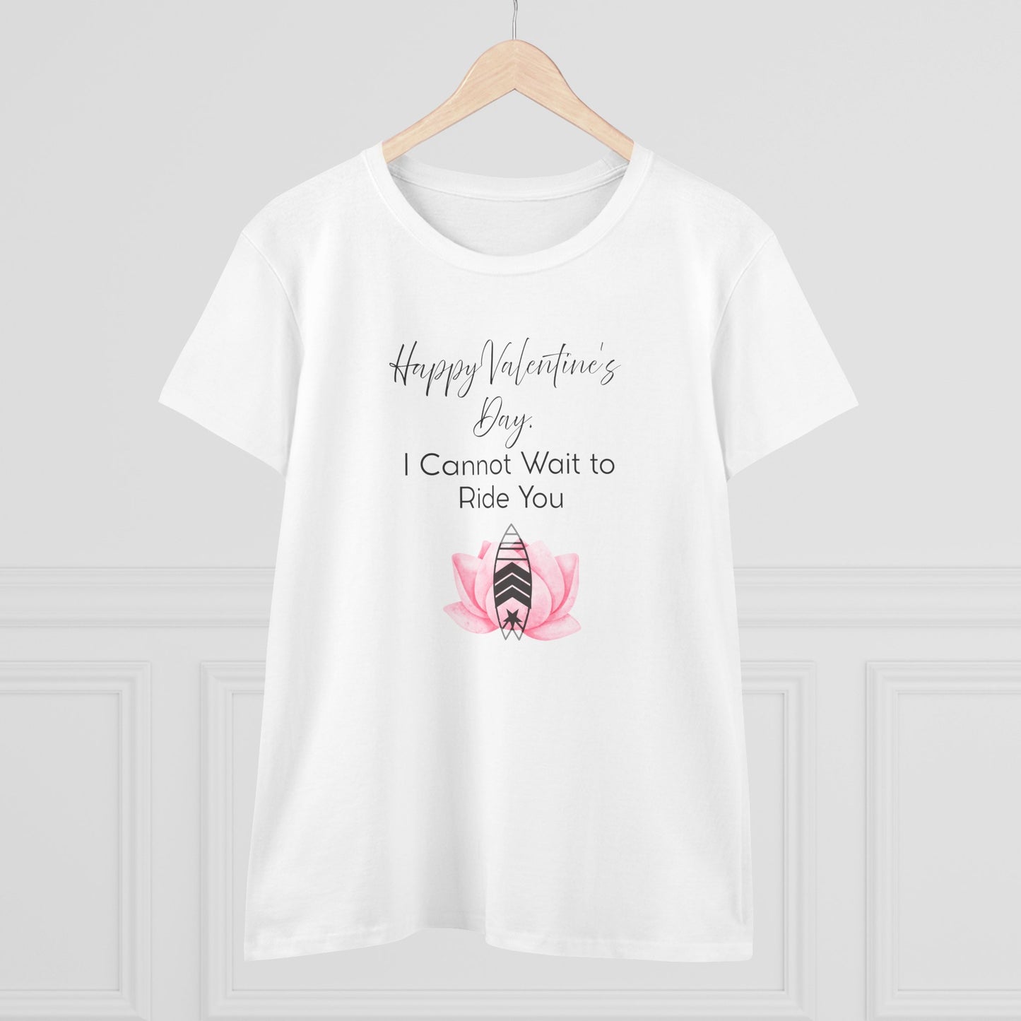 White t-shirt with Valentine's Day design on a wooden hanger against a white background