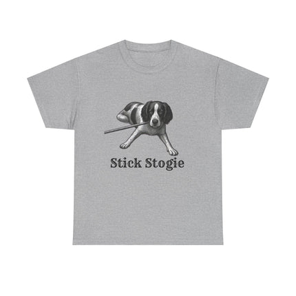 A heather gray short-sleeve crewneck t-shirt featuring a black and white graphic of a dog proudly chewing a stick, with the text 'Stick Stogie' printed below.