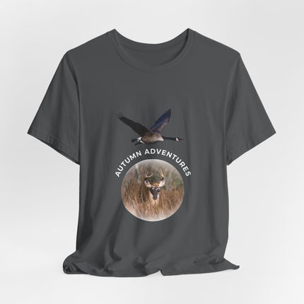 An gray short-sleeve t-shirt with a graphic print on the front showing a flying goose above a deer head inside a circle with the text 'AUTUMN ADVENTURES'.