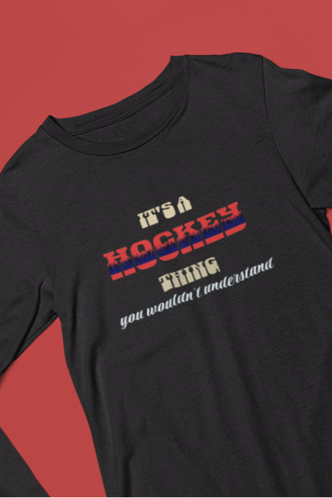 Black t-shirt with colorful text design on a red background